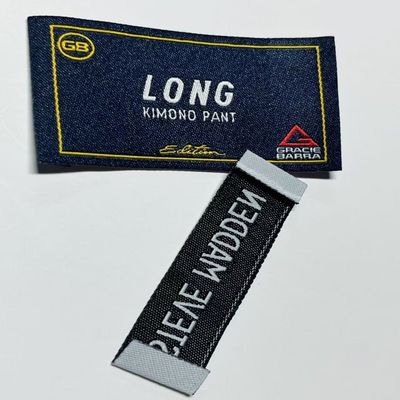 Ultrasone snijden geborduurde geweven kleding etiketten kleding etiketten Custom
